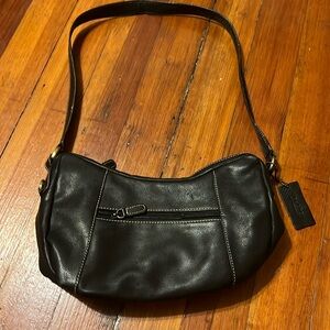 Excellent condition!  Genuine leather! Lots of compartments!
